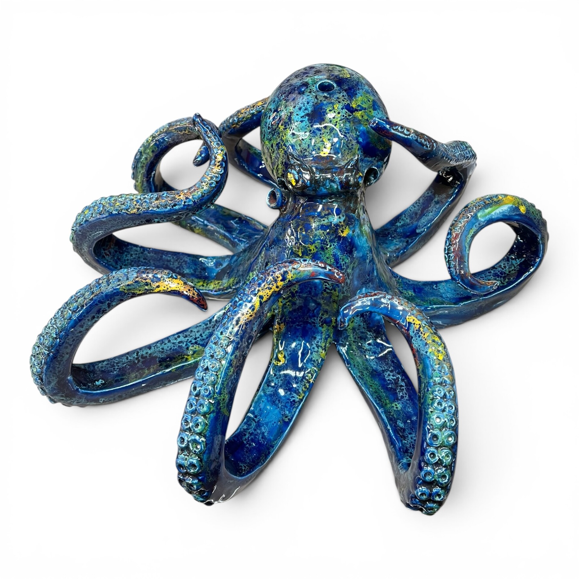 Scultura Polpo gigante decoro blu marino sfumature rosse e gialle in ceramica siciliana Produzione artigianale di Palermo lunghezza 40cm