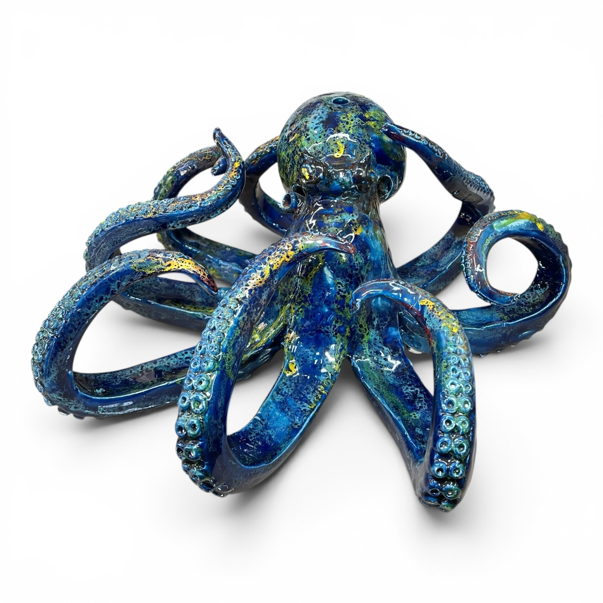 Scultura Polpo gigante decoro blu marino sfumature rosse e gialle in ceramica siciliana Produzione artigianale di Palermo lunghezza 40cm