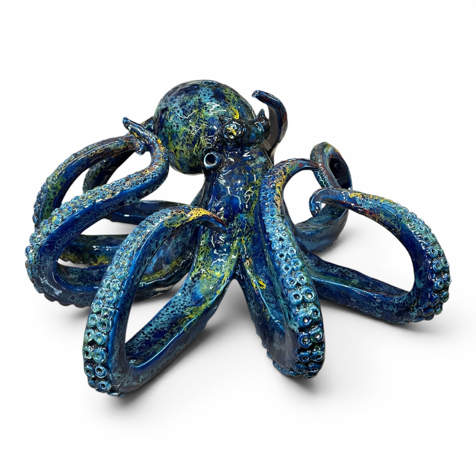 Scultura Polpo gigante decoro blu marino sfumature rosse e gialle in ceramica siciliana Produzione artigianale di Palermo lunghezza 40cm