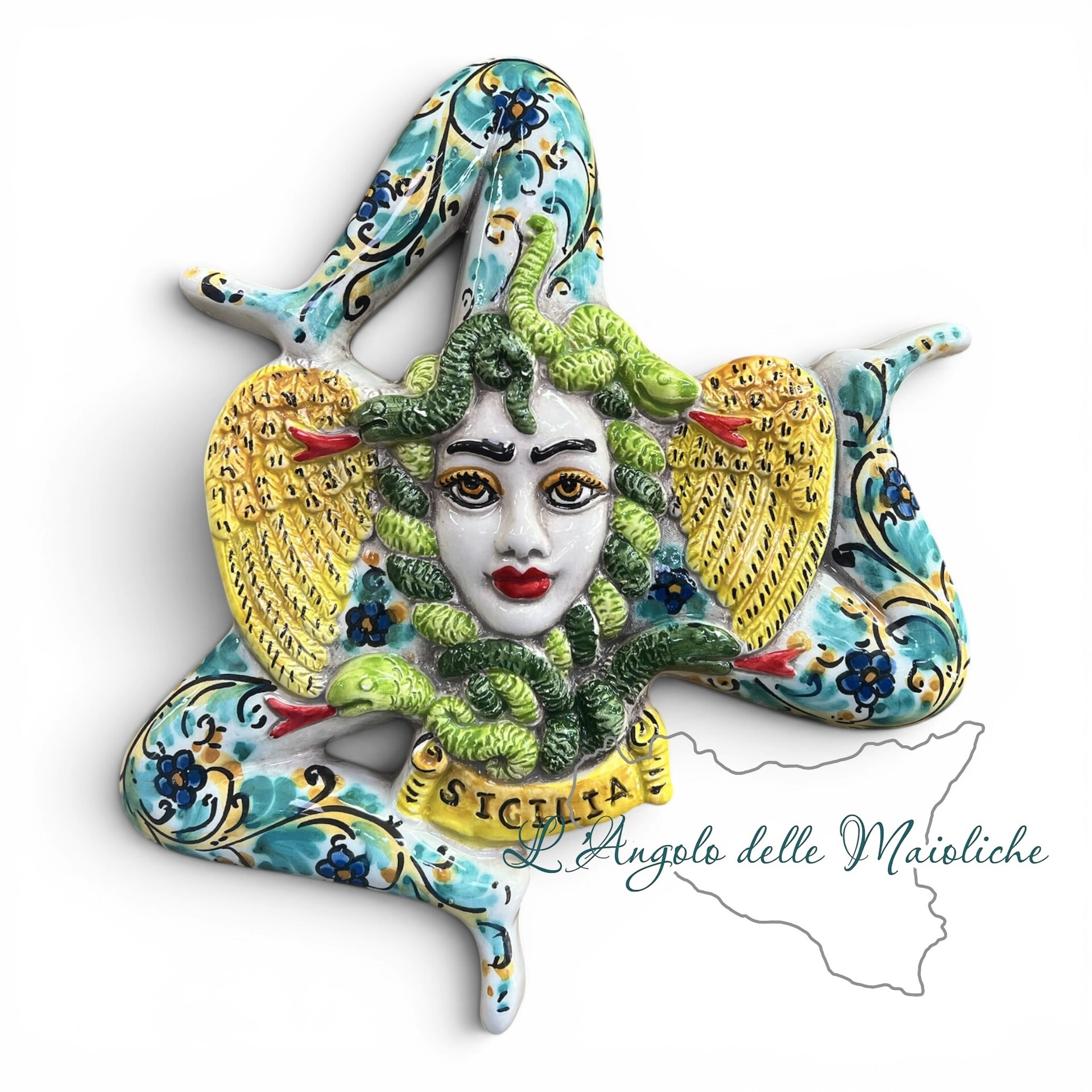 Trinacria ornamentale da parete decoro seicento verde in ceramica siciliana Produzione artigianale di Caltagirone Lunghezza 27cm