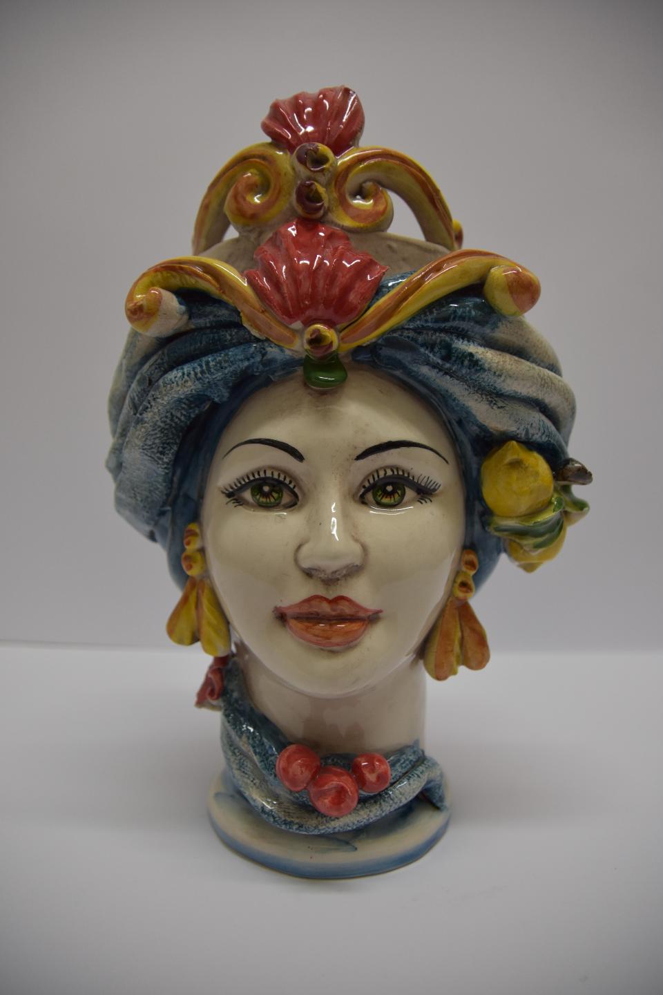Coppia teste di moro con turbante e limoni Produzione artigianale  di Caltagirone h. 31 cm