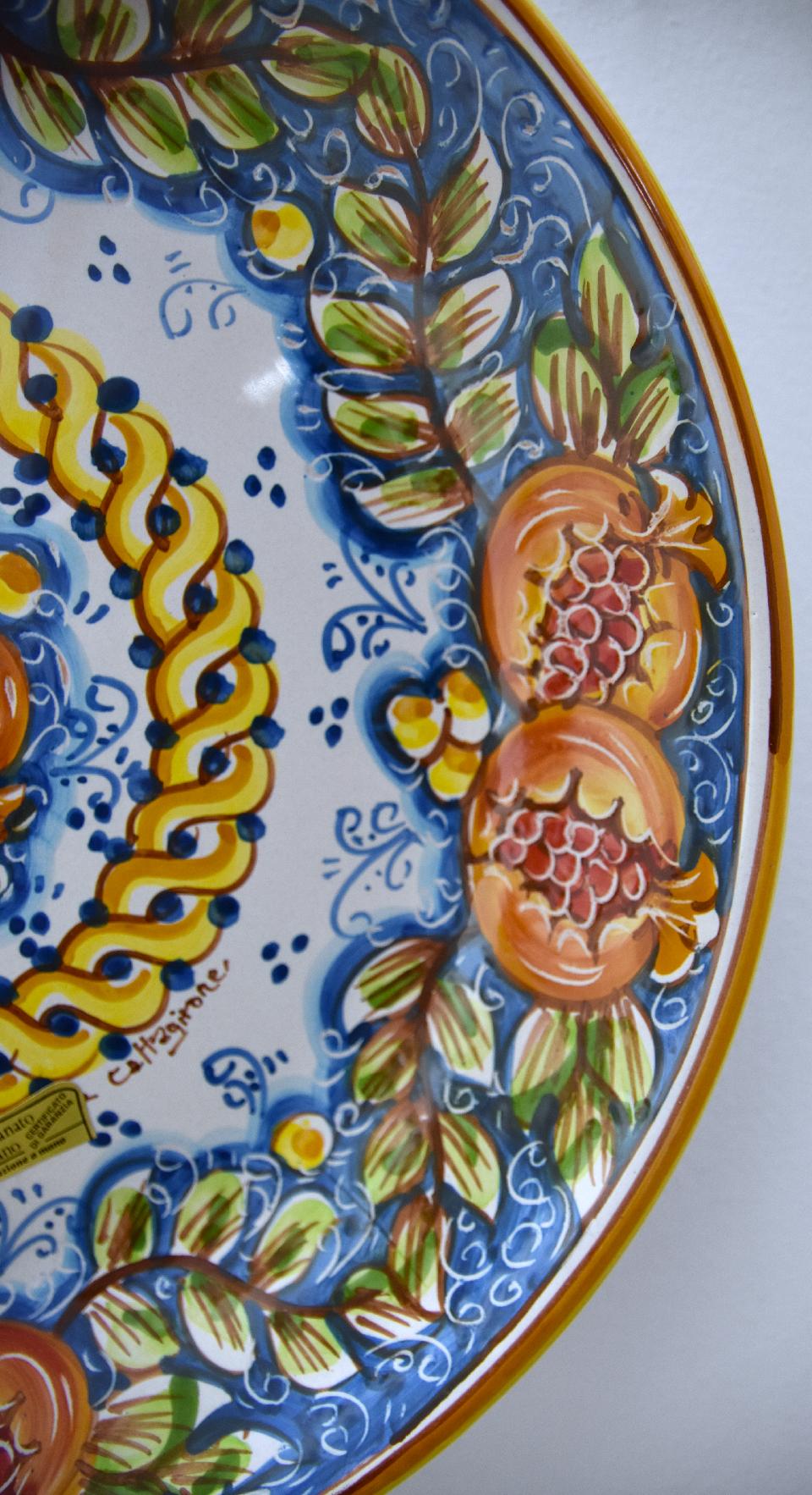 Piatto con melograni in ceramica da parete Produzione artigianale di Caltagirone Diametro 37cm
