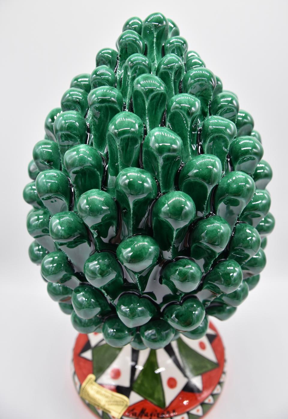 Pigna siciliana in ceramica verde ramina h.25 cm Produzione artigianale di Caltagirone con base decorata