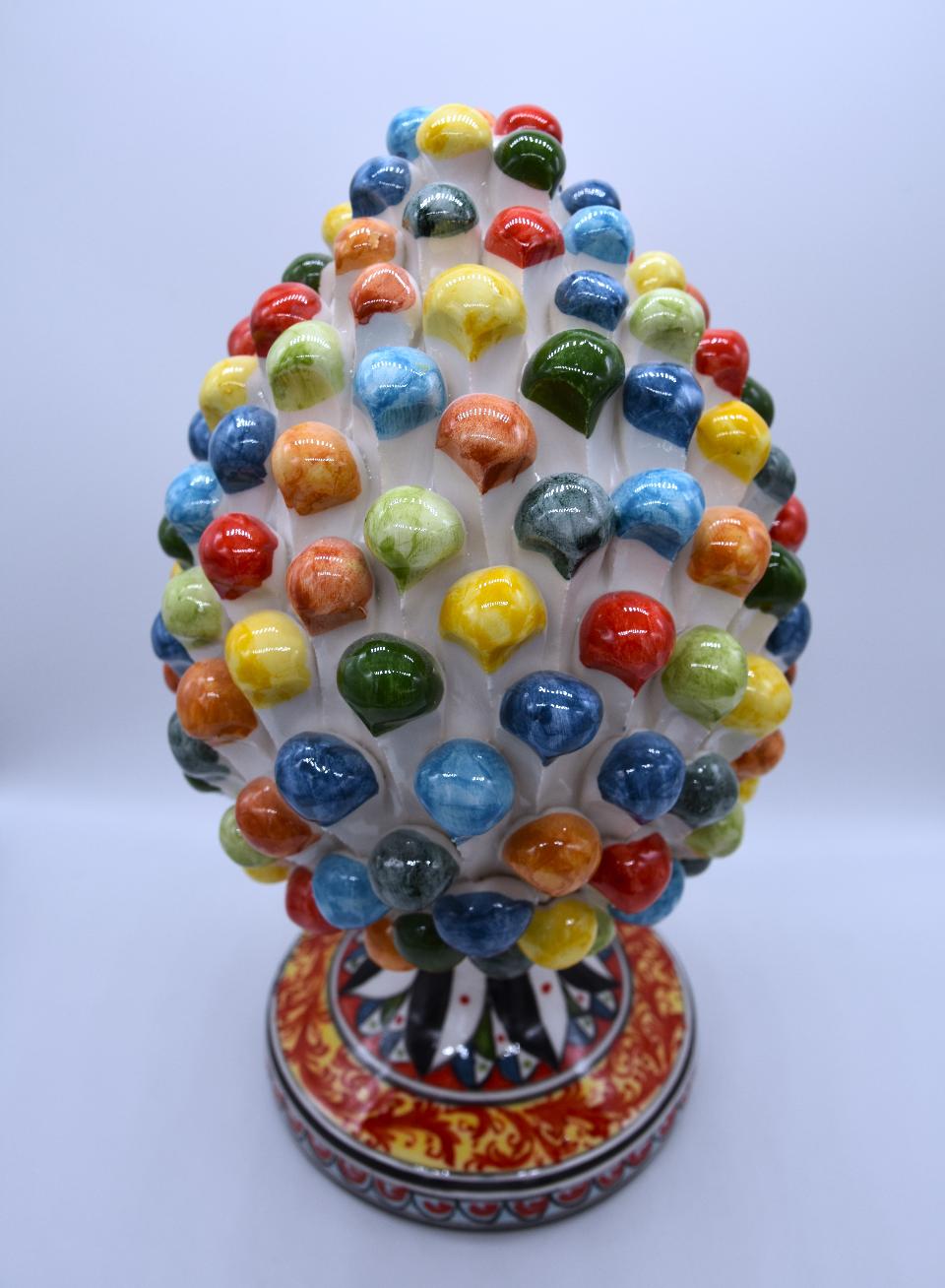 Pigna siciliana in ceramica multicolore arlecchino h.25 cm Produzione artigianale di Caltagirone con base decorata