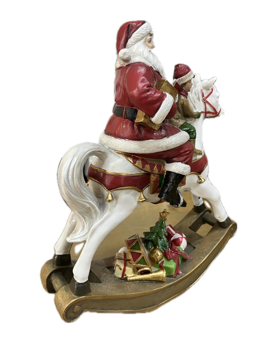 Babbo Natale sul cavallo H 35cm