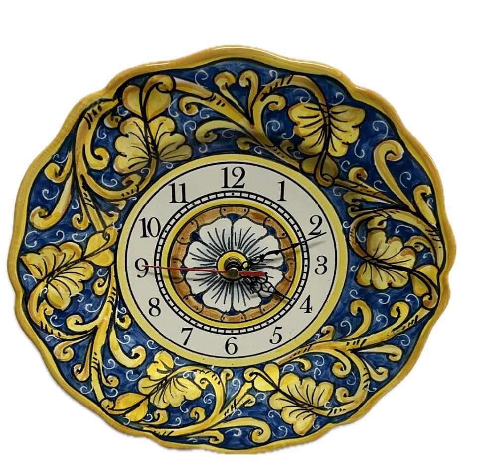 Orologio smerlato da parete in ceramica siciliana decoro valentino giallo fondo blu Produzione artigianale di Santo Stefano di Camastra Diametro 25cm