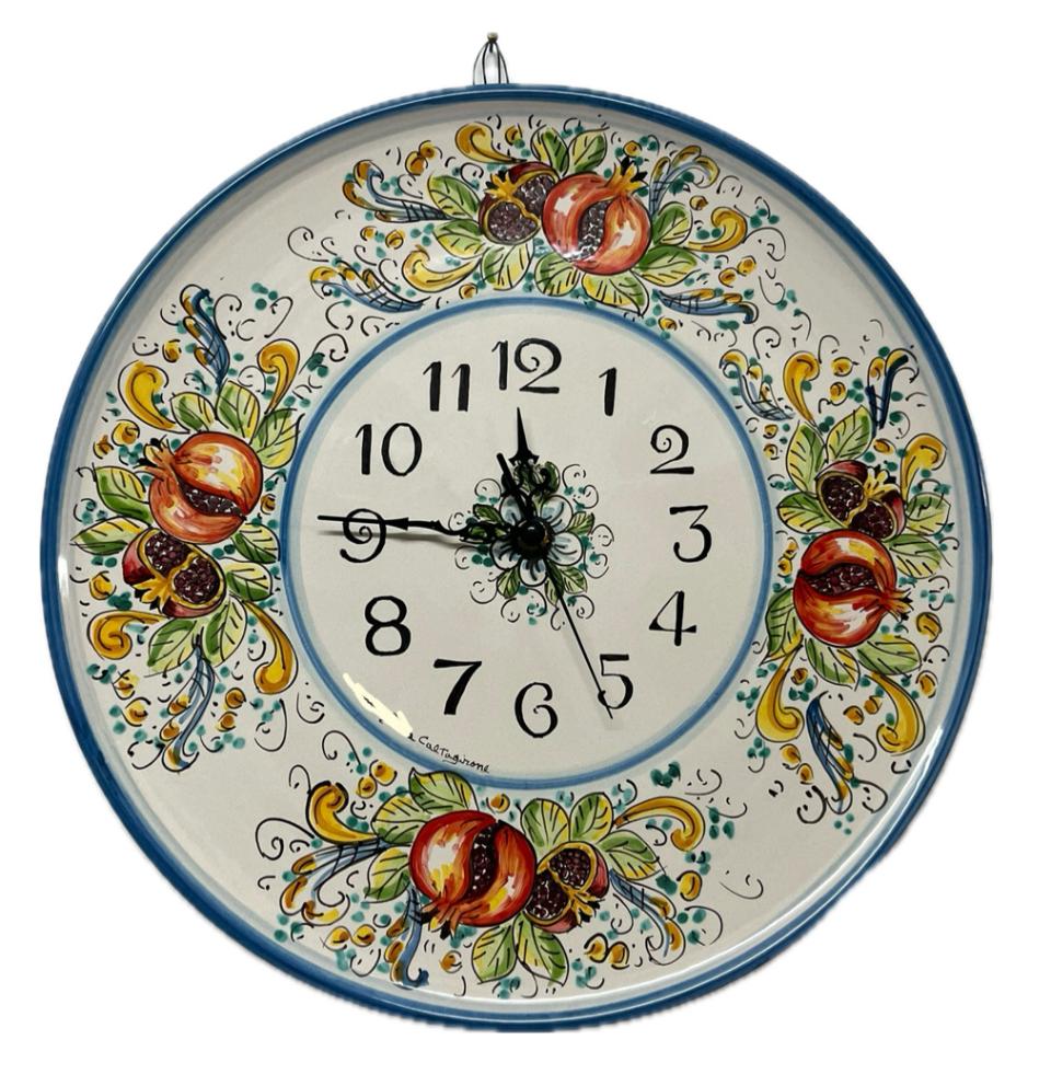 Orologio da parete con melograni fondo bianco in ceramica siciliana Produzione artigianale di Caltagirone diametro 45cm