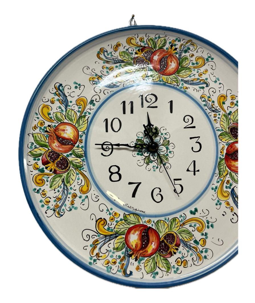 Orologio da parete con melograni fondo bianco in ceramica siciliana Produzione artigianale di Caltagirone diametro 45cm