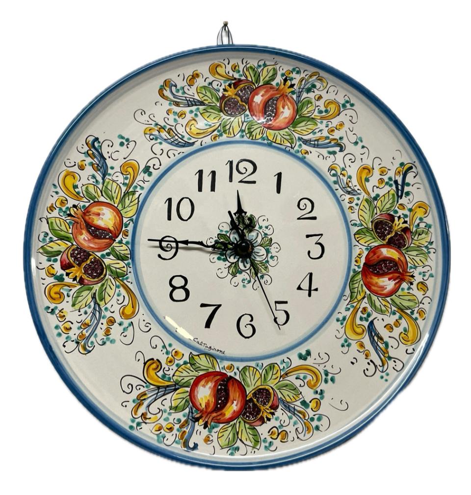 Orologio da parete con melograni fondo bianco in ceramica siciliana Produzione artigianale di Caltagirone diametro 45cm