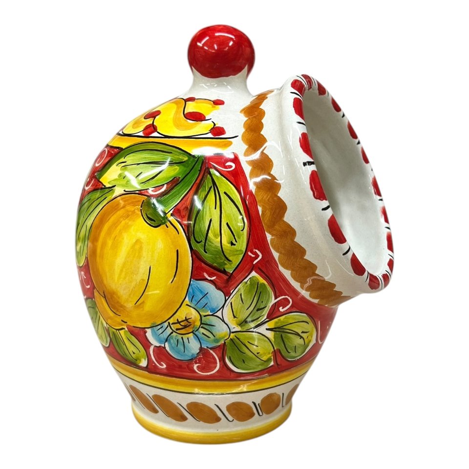 Saliera a salvadanaio in ceramica siciliana con limoni fondo rosso Produzione artigianale di Santo Stefano di Camastra h.20cm