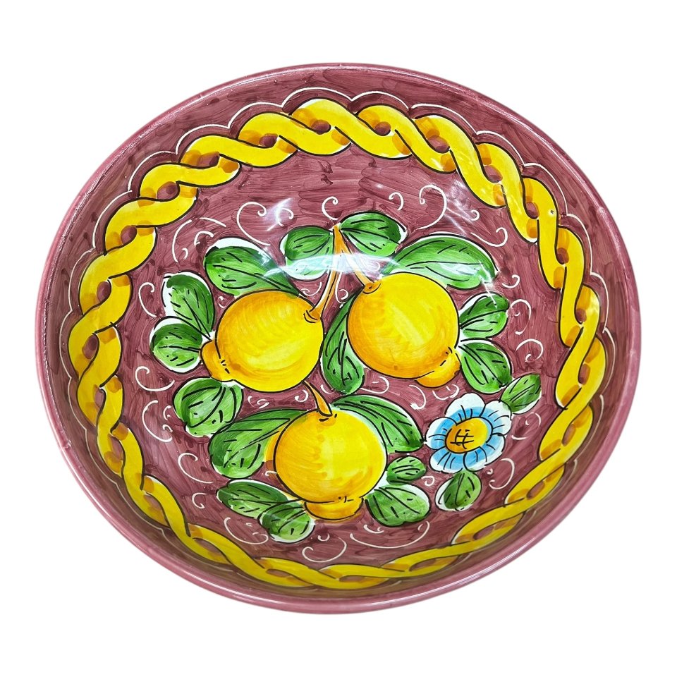 Ciotola centrotavola in ceramica siciliana con limoni decoro treccia fondo bordeaux Produzione artigianale di Santo Stefano di Camastra Diametro 25cm