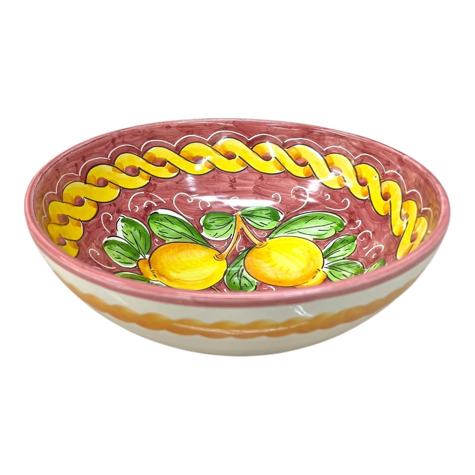 Ciotola centrotavola in ceramica siciliana con limoni decoro treccia fondo bordeaux Produzione artigianale di Santo Stefano di Camastra Diametro 25cm