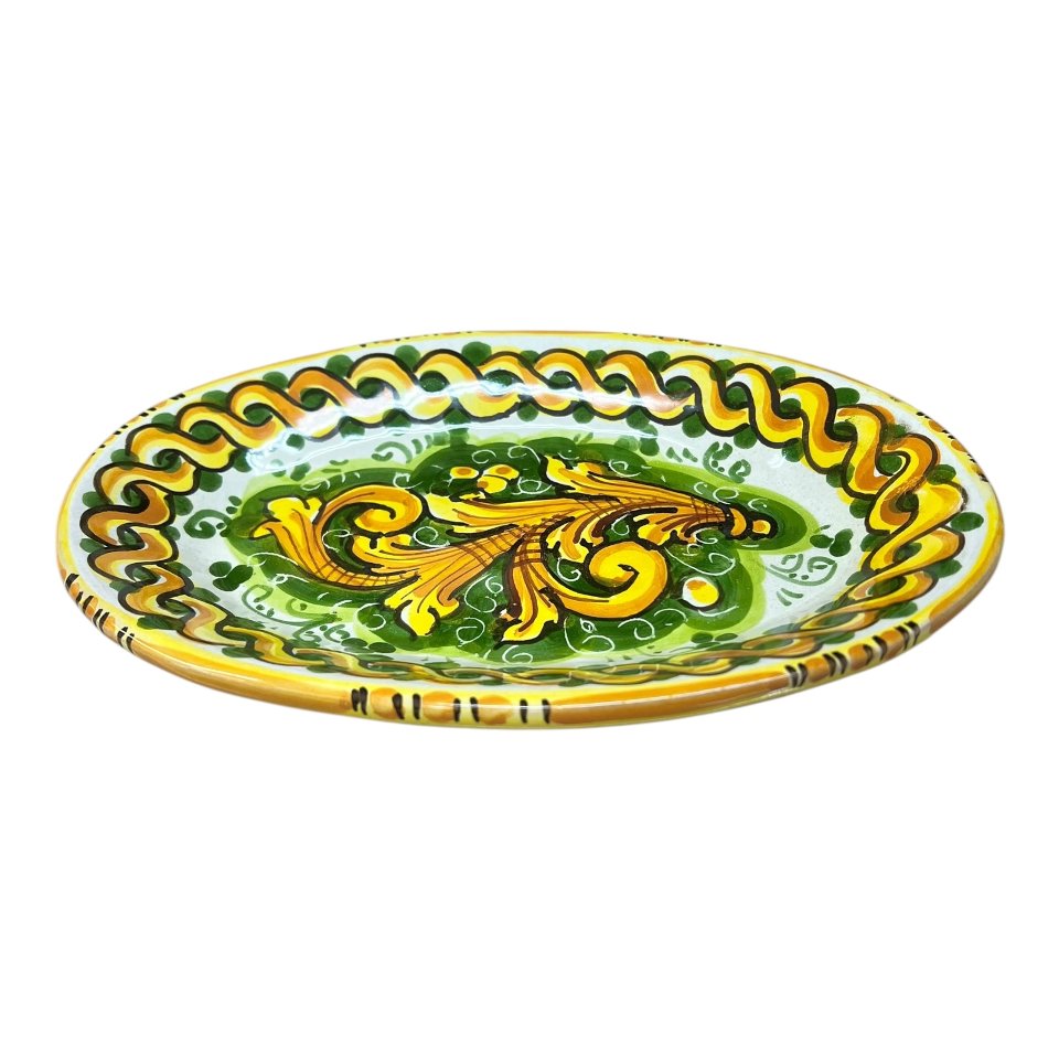 Piatto ornamentale ovale da parete in ceramica siciliana decoro ornato giallo e verde Produzione artigianale di Caltagirone Lunghezza 22cm