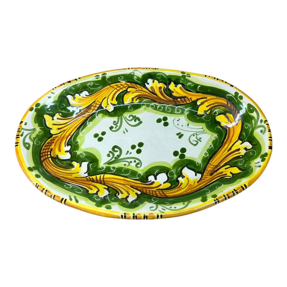 Piatto ornamentale ovale da parete in ceramica siciliana decoro ornato giallo e verde Produzione artigianale di Caltagirone Lunghezza 22cm
