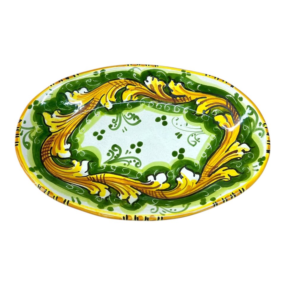 Piatto ornamentale ovale da parete in ceramica siciliana decoro ornato giallo e verde Produzione artigianale di Caltagirone Lunghezza 22cm
