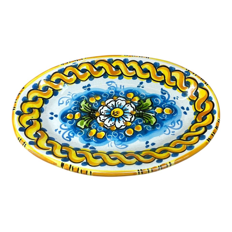 Piatto ornamentale ovale da parete in ceramica siciliana con margherita fondo blu Produzione artigianale di Caltagirone Lunghezza 22cm