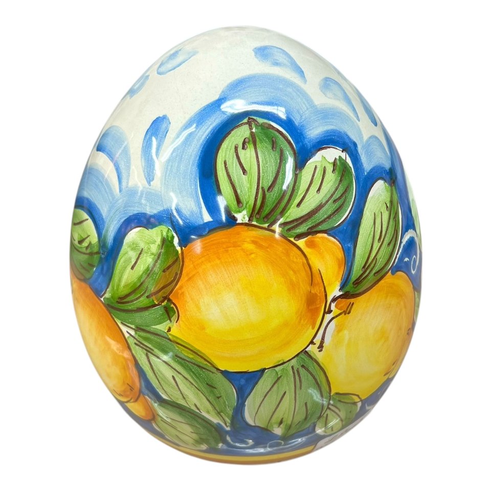 Uovo di Pasqua in ceramica siciliana con limoni e margherite fondo blu Produzione artigianale di Santo Stefano di Camastra h.20cm