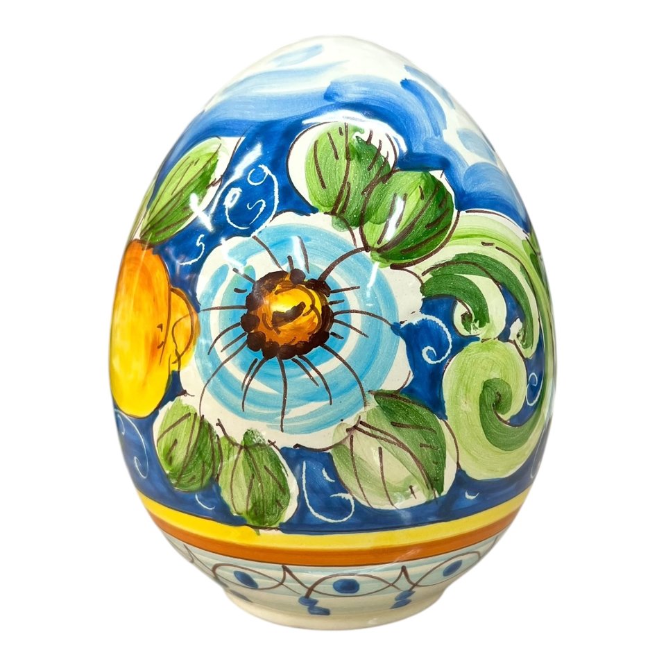 Uovo di Pasqua in ceramica siciliana con limoni e margherite fondo blu Produzione artigianale di Santo Stefano di Camastra h.20cm