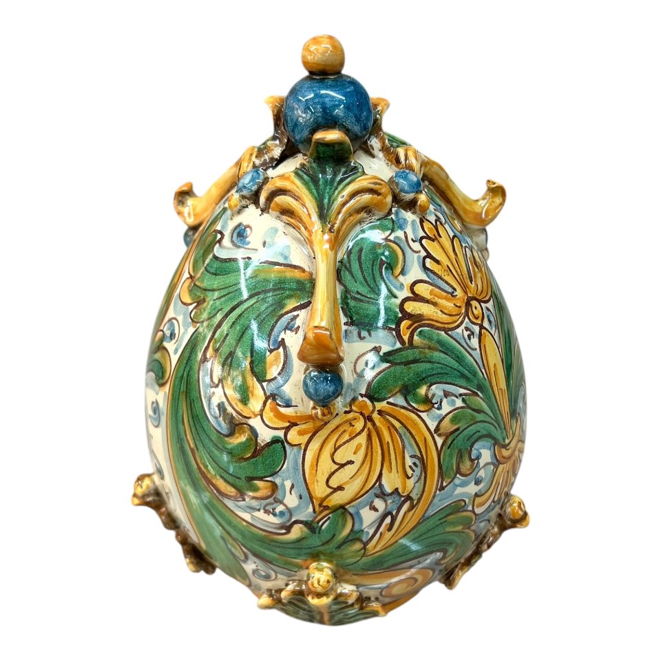 Uovo di Pasqua in pregiata ceramica siciliana decoro ornato floreale verde e giallo Produzione artigianale di Caltagirone h.24cm