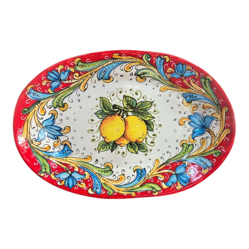 Piatto ovale da parete in ceramica siciliana decoro floreale con limoni Produzione artigianale di Santo Stefano di Camastra Lunghezza 37cm