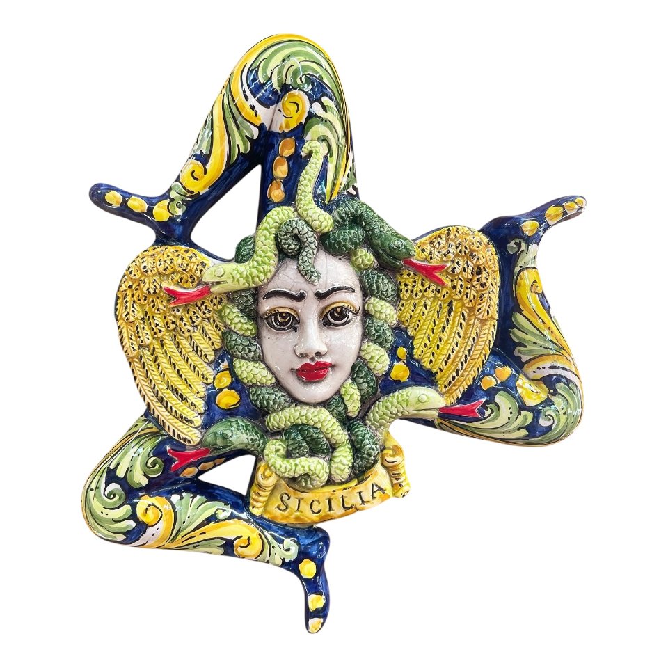 Trinacria ornamentale da parete in ceramica siciliana decoro ornato barocco fondo blu Produzione artigianale di Caltagirone lunghezza 30cm
