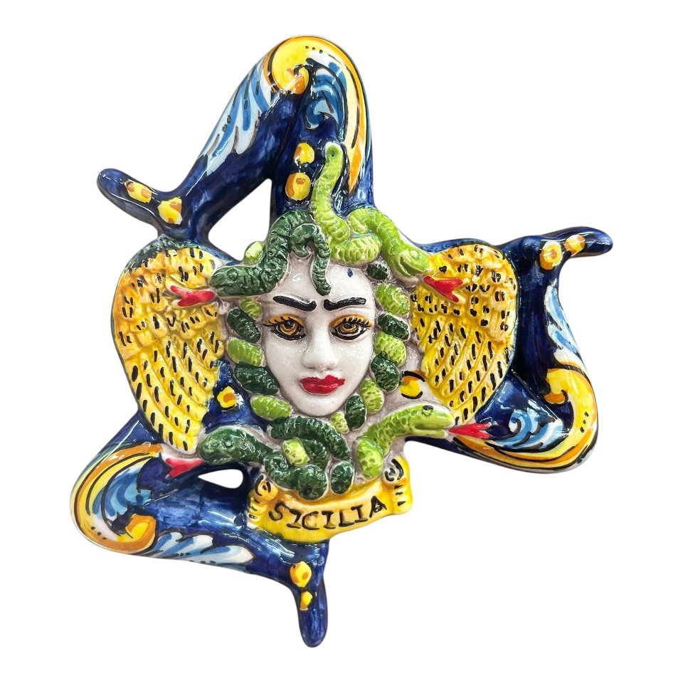 Trinacria ornamentale da parete in ceramica siciliana decoro ornato fondo blu Produzione artigianale di Caltagirone Lunghezza 17cm