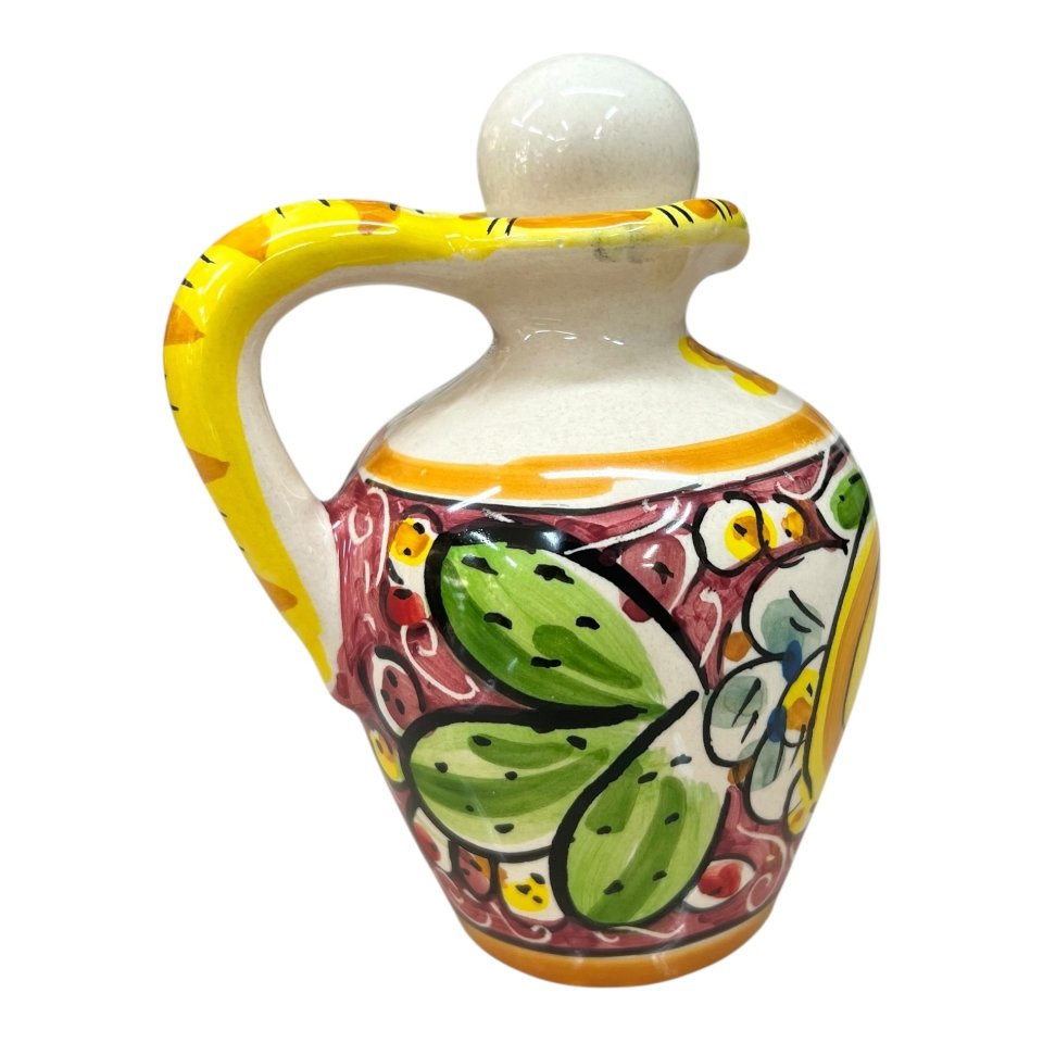 Oliera con manico in ceramica siciliana decoro limoni e fichi d’india fondo bordeaux Produzione artigianale di Caltagirone h.13cm