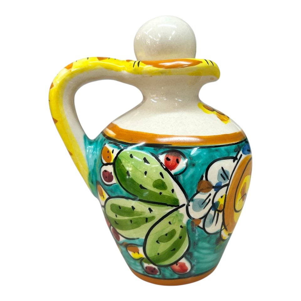Oliera con manico in ceramica siciliana decoro limoni e fichi d’india fondo verde Produzione artigianale di Caltagirone h.13cm