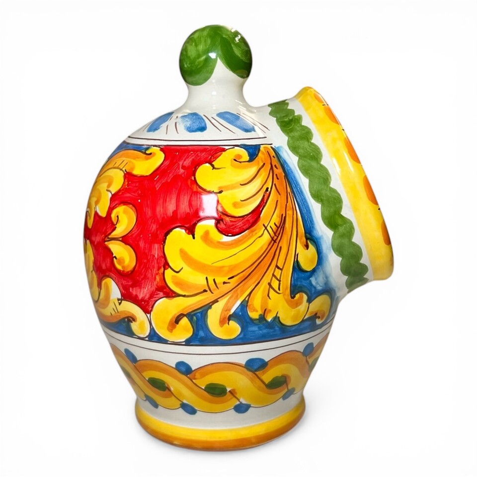 Saliera a salvadanaio in ceramica siciliana decoro barocco giallo fondo rosso e blu Produzione artigianale di Santo Stefano di Camastra h.20 cm