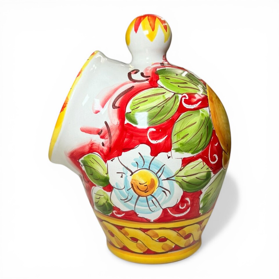 Saliera a salvadanaio in ceramica siciliana decoro con limoni e margherite fondo rosso intrecciato Produzione artigianale di Santo Stefano di Camastra h.20cm