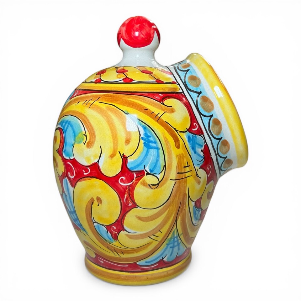 Saliera a salvadanaio in ceramica siciliana decoro barocco giallo e celeste fondo rosso Produzione artigianale di Santo Stefano di Camastra h.20cm