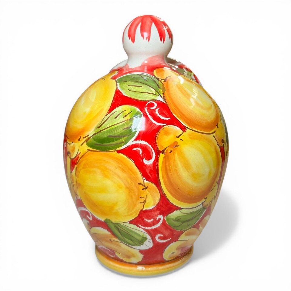 Saliera a salvadanaio in ceramica siciliana decoro barocco giallo con limoni fondo rosso Produzione artigianale di Santo Stefano di Camastra h.20cm