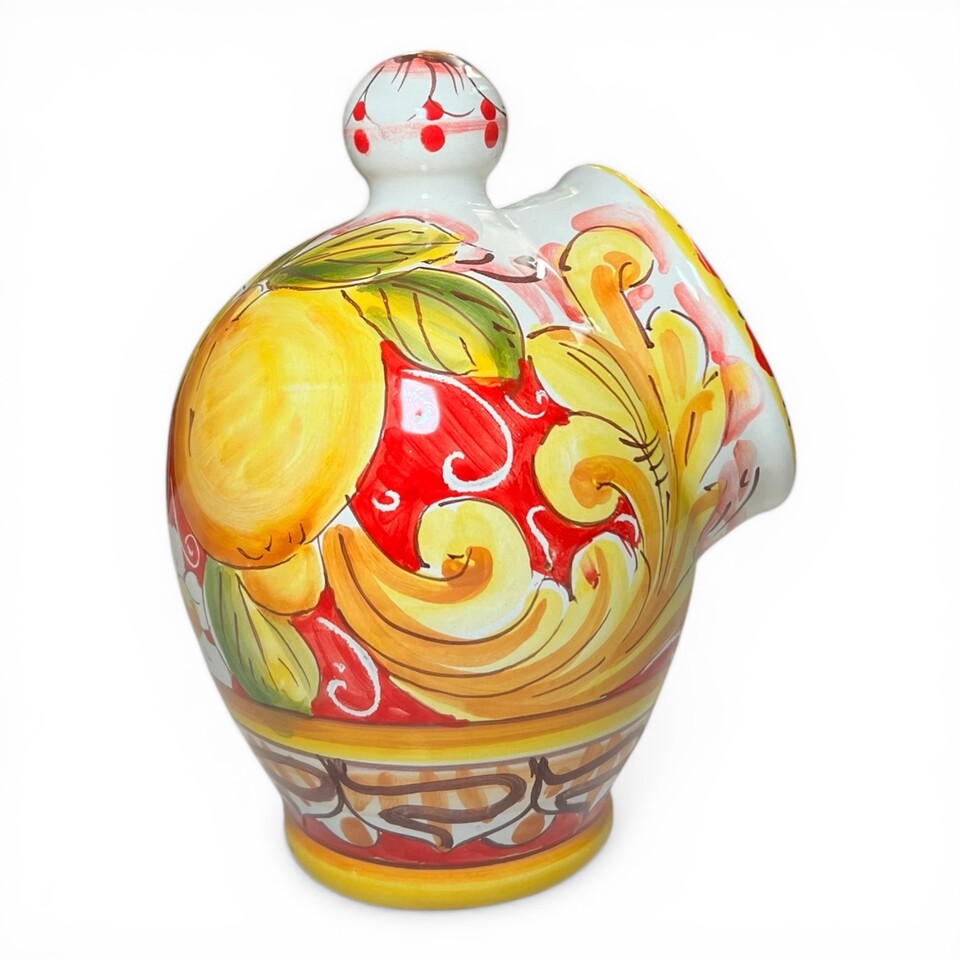 Saliera a salvadanaio in ceramica siciliana decoro barocco giallo con limoni e margherite Produzione artigianale di Santo Stefano di Camastra h.20cm