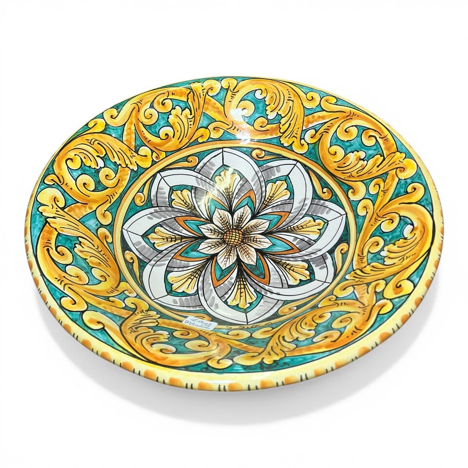Alzata centrotavola in ceramica siciliana decoro ornato giallo fondo verde Produzione artigianale di Santo Stefano di Camastra Diametro 40cm