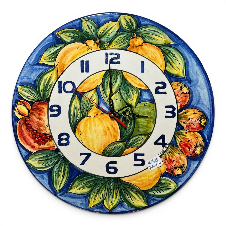 Orologio da parete liscio decoro limoni fichi d’india e melograni in ceramica siciliana Produzione artigianale di Santo Stefano di Camastra Diametro 38cm