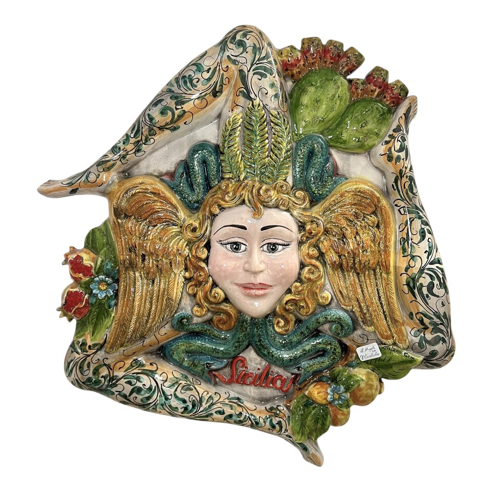 Trinacria ornamentale da parete gigante decorata con frutta in rilievo in ceramica siciliana Produzione artigianale di Santo Stefano di Camastra Lunghezza 55cm