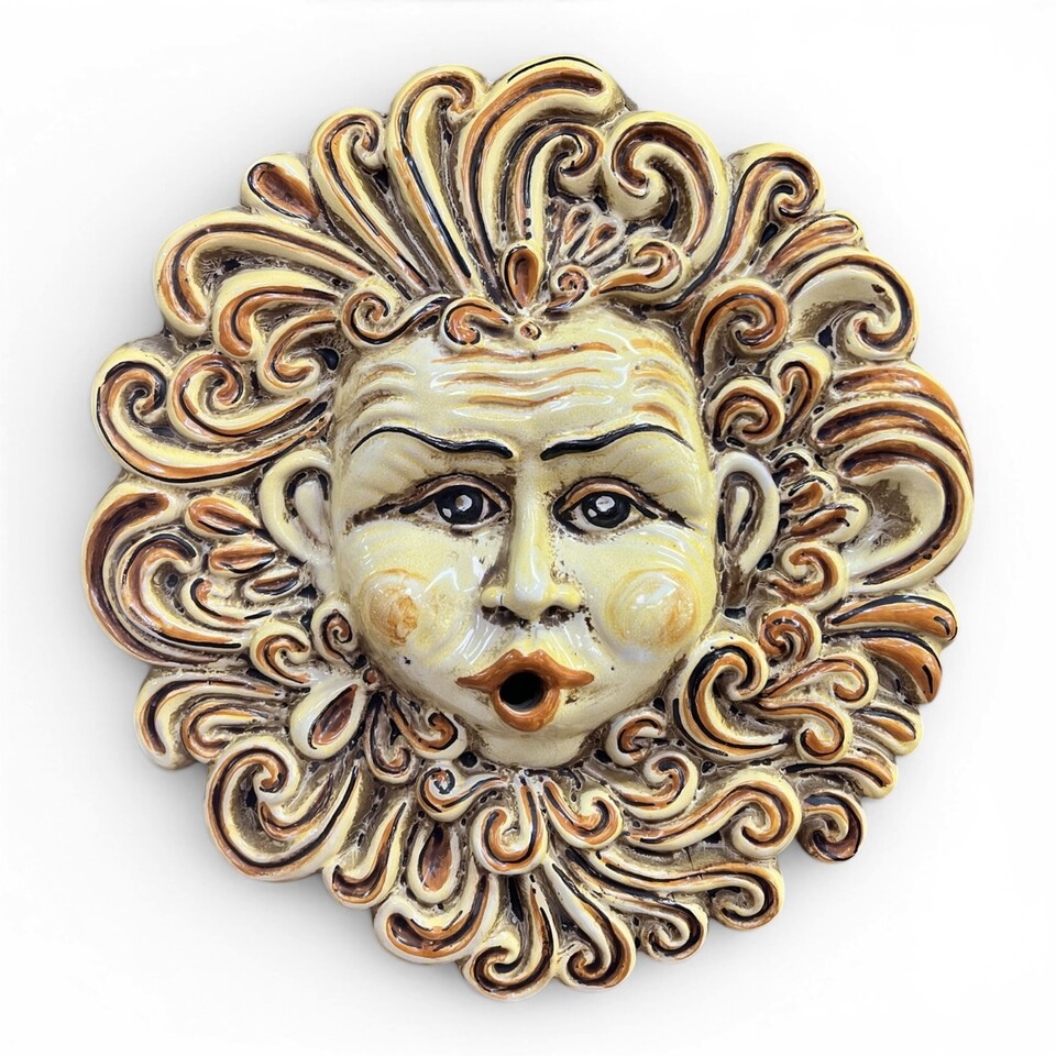 Maschera Eolo da parete decoro giallo antichizzato in ceramica siciliana Produzione artigianale di Caltagirone Diametro 30cm