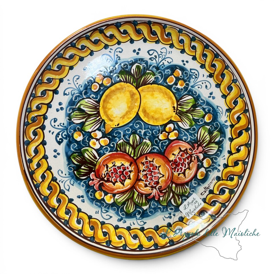 Piatto ornamentale da parete decoro limoni e melograni treccia fondo blu in ceramica siciliana Produzione artigianale di Caltagirone Diametro 30cm