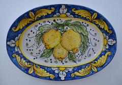 Piatto ornamentale ovale da parete con limoni Produzione artigianale di Santo Stefano di Camastra Lunghezza 40cm