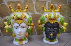 Coppia Teste di moro con frutta arance/limoni Cibele e Attis Produzione artigianale di Caltagirone h.30 cm