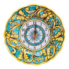 Orologio da parete in ceramica siciliana smerlato decoro barocco giallo e verde acqua Produzione artigianale di Santo Stefano di Camastra Diametro 25cm