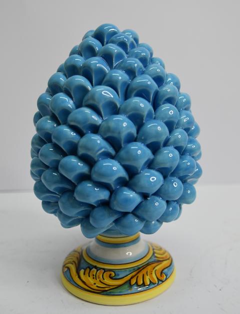 Pigna siciliana in ceramica celeste h.20 Produzione artigianale di Caltagirone con base decorata
