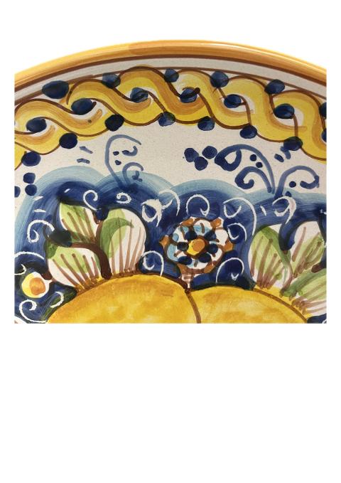 Piatto ornamentale da parete decoro limoni con treccia fondo blu in ceramica siciliana Produzione artigianale di Caltagirone diametro 26cm