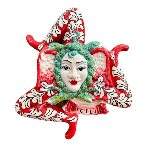 Trinacria in ceramica siciliana decoro ornato barocco bianco fondo rosso Produzione artigianale  di Caltagirone Lunghezza 28cm