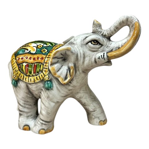 Elefante portafortuna in ceramica siciliana decoro ornato fondo verde Produzione artigianale di Caltagirone lunghezza 20cm