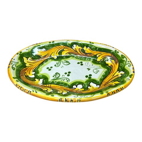 Piatto ornamentale ovale da parete in ceramica siciliana decoro ornato giallo e verde Produzione artigianale di Caltagirone Lunghezza 22cm