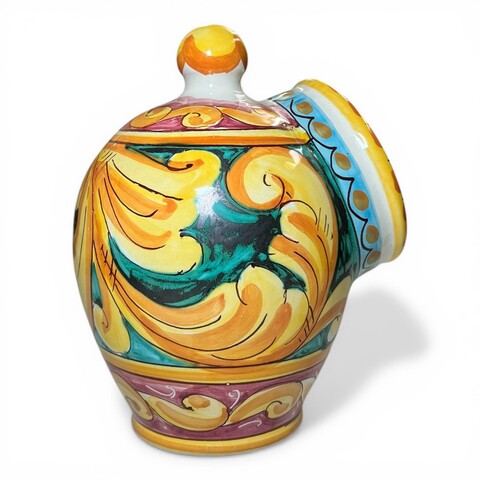 Saliera a salvadanaio in ceramica siciliana decoro barocco giallo fondo verde e bordeaux Produzione artigianale di Santo Stefano di Camastra h.20cm