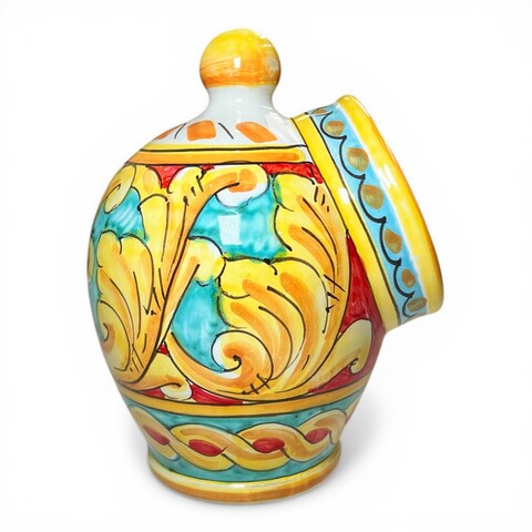 Saliera a salvadanaio in ceramica siciliana decoro barocco giallo fondo celeste e rosso Produzione artigianale di Santo Stefano di Camastra h.20cm