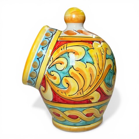 Saliera a salvadanaio in ceramica siciliana decoro barocco giallo fondo celeste e rosso Produzione artigianale di Santo Stefano di Camastra h.20cm