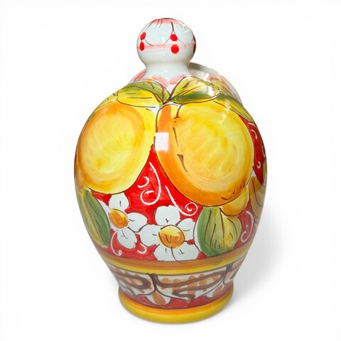 Saliera a salvadanaio in ceramica siciliana decoro barocco giallo con limoni e margherite Produzione artigianale di Santo Stefano di Camastra h.20cm